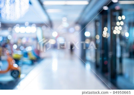 Bokeh abstract blur light of inside shopping complex Department store background Bokeh abstract blur light of inside shopping complex Department store background 84950665