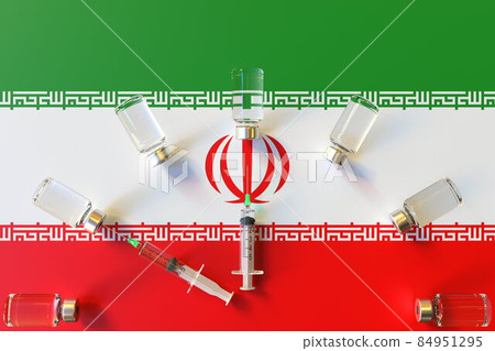 Syringes and medical vials on the flag of Iran. Vaccination related conceptual 3D rendering Syringes and medical vials on the flag of Iran. Vaccination related conceptual 3D rendering 84951295