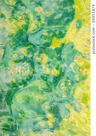 Macro photography of a stabilized wooden block with a color dye, The texture of a decorative wood Acer, maples, Natural wood pattern Macro photography of a stabilized wooden block with a color dye, The texture of a decorative wood Acer, maples, Natural wood pattern 84951874