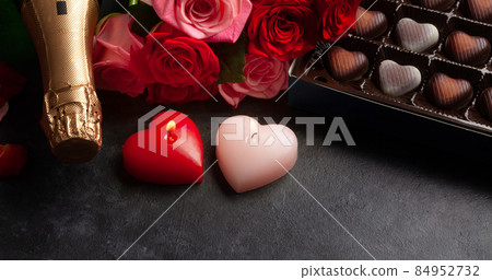 Champagne bottle and heart candy Champagne bottle and heart candy 84952732