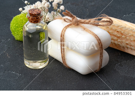 Skincare organic soap bars with plants extracts on gray surface. 84953301