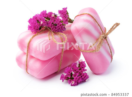 Pink bars of handmade natural soap and flowers isolated on white Pink bars of handmade natural soap and flowers isolated on white 84953337