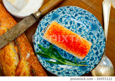 French cheese and fresh  baguette on a wood cutter 84955122