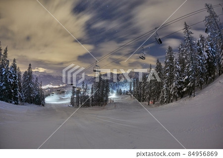 Ski lift at night under the stars in the sky 84956869