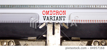Covid-19 new omicron virus variant symbol. Concept words Omicron variant typed on retro typewriter. Medical and COVID-19 pandemic new omicron variant strain mutation concept. 84957168