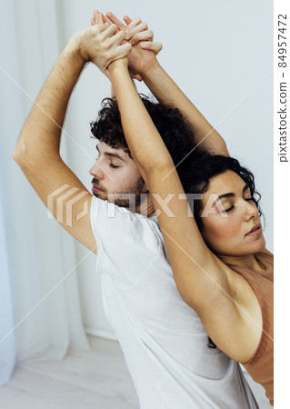 woman and man steam fitness yoga asana gymnastics woman and man steam fitness yoga asana gymnastics 84957472