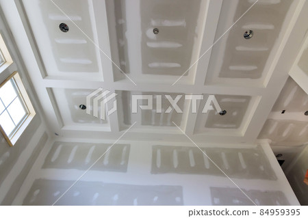 New house under construction with finishing plastering drywall 84959395