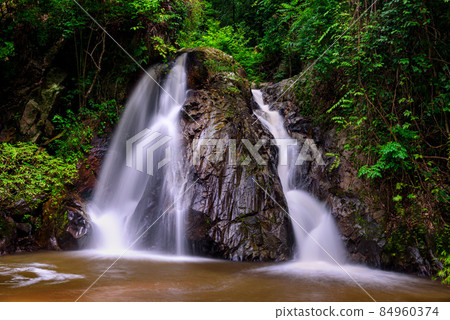 Leva or Rak Jung Na mon Waterfall at Ban Na mon in Wiang Haeng District, Chiang Mai, Thailand. Leva or Rak Jung Na mon Waterfall at Ban Na mon in Wiang Haeng District, Chiang Mai, Thailand. 84960374
