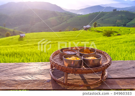 Local food at the balcony of Pa Bong Piang Village, Mae Chaem District, Chiang Mai Province, Thailand Local food at the balcony of Pa Bong Piang Village, Mae Chaem District, Chiang Mai Province, Thailand 84960383