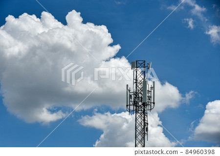 Telecommunication towers with motions clouds on blue sky background. 84960398