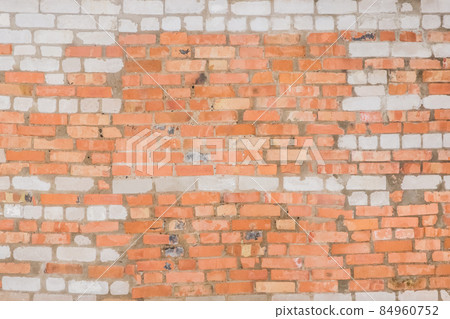 Old brick wall with red brown and white stone surface texture background Old brick wall with red brown and white stone surface texture background 84960752