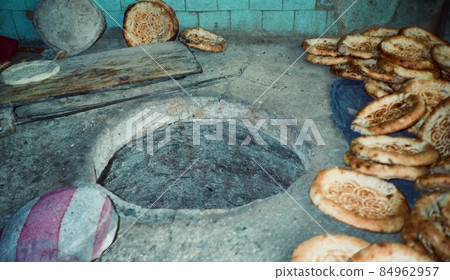 "Tonul (kiln)" for baking naan-March 1991 (Xinjiang Uygur Autonomous Region / Turfan / People's Republic of China) "Tonul (kiln)" for baking naan-March 1991 (Xinjiang Uygur Autonomous Region / Turfan / People's Republic of China) 84962957