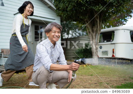 Gardening senior couple Gardening senior couple 84963089