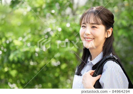 Image of a business looking up at the sky that could be used for recruiting and hiring women 6 Copy space available 84964294