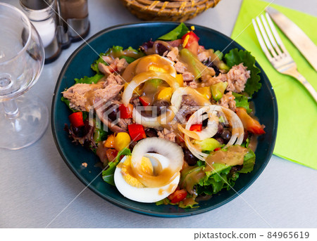 Traditional dish of French cuisine is the Nicoise salad Traditional dish of French cuisine is the Nicoise salad 84965619