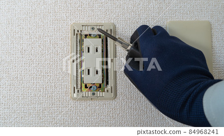 Workers repairing outlet plates Electrical work image Workers repairing outlet plates Electrical work image 84968241