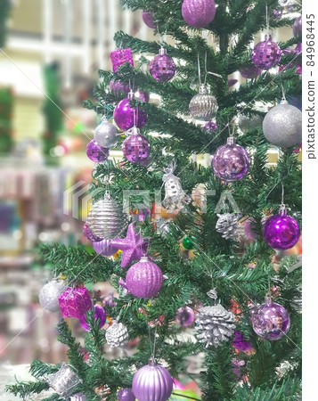 Christmas tree decorated with beautiful ornaments Christmas tree decorated with beautiful ornaments 84968445