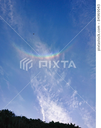 Upside-down rainbow, Circumzenithal arc seen on a sunny day in spring 84969043