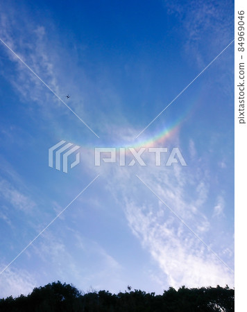 Upside-down rainbow, Circumzenithal arc seen on a sunny day in spring 84969046