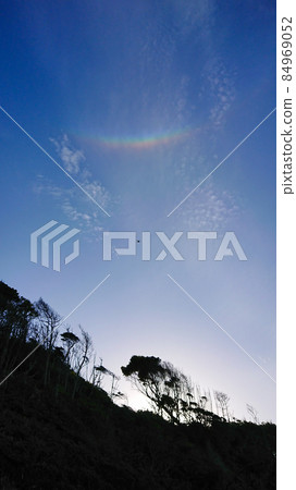 Upside-down rainbow, Circumzenithal arc seen on a sunny day in spring 84969052