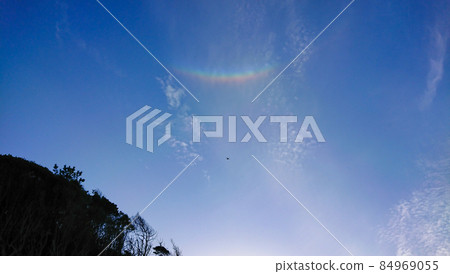 Upside-down rainbow, Circumzenithal arc seen on a sunny day in spring 84969055