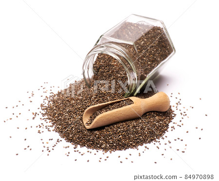 glass can full of organic natural chia seeds close-up isolated on white background 84970898