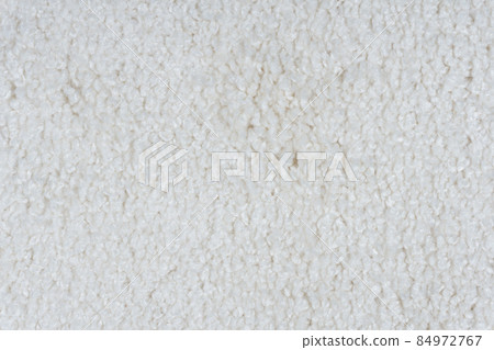 Carpet covering background. Pattern and texture of gray colour carpet. Copy space  84972767