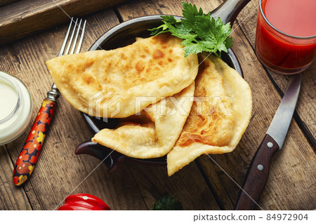 Fried pies with meat filling Fried pies with meat filling 84972904