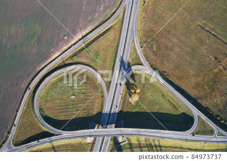 Crossroad on highway aerial view Crossroad on highway aerial view 84973737