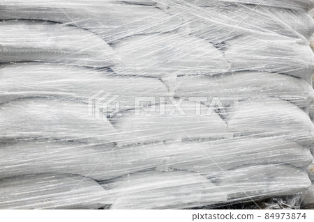 bags with products or raw materials for the manufacture of products in the warehouse bags with products or raw materials for the manufacture of products in the warehouse 84973874