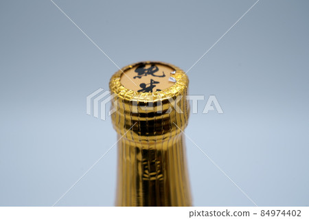 Close-up of sake cap with shrink wrap Close-up of sake cap with shrink wrap 84974402
