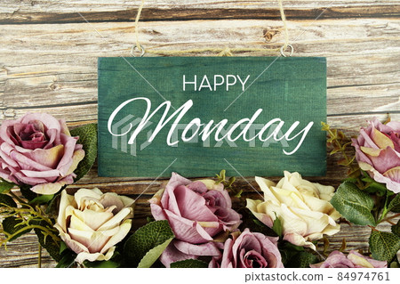 Happy Monday typography text with roses flowers bouquet on wooden background Happy Monday typography text with roses flowers bouquet on wooden background 84974761