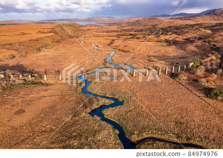 Aerial view of the Owencarrow Railway Viaduct by Creeslough in County Donegal - Ireland 84974976