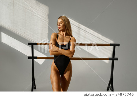 Slender young woman with beautiful fit body 84975746