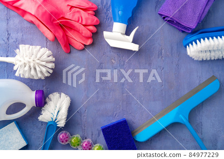 Cleaning supplies for household flatlay on gray background 84977229