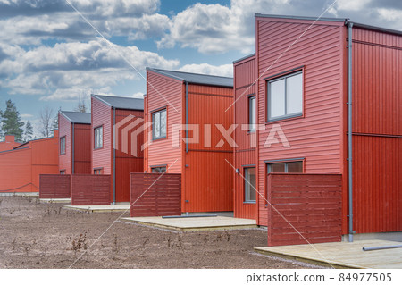 Street with Scandinavian style just finished townhouses or condominium apartments Street with Scandinavian style just finished townhouses or condominium apartments 84977505
