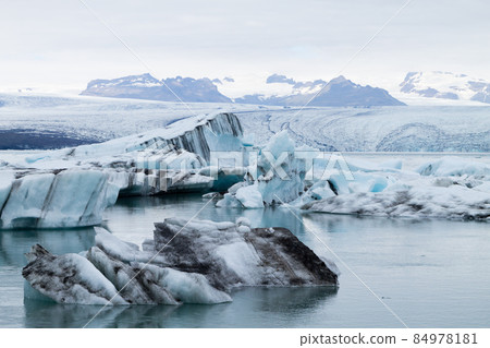 Icebergs on water, Jokulsarlon glacial lake, Iceland Icebergs on water, Jokulsarlon glacial lake, Iceland 84978181