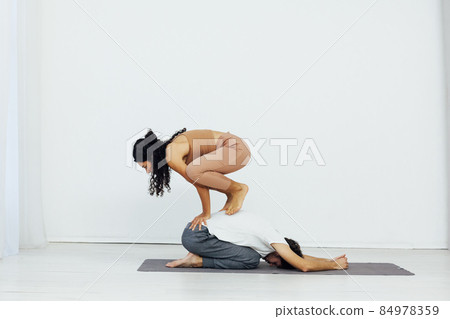 man and woman paired fitness yoga asana gymnastics 84978359