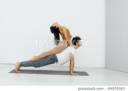 man and woman paired fitness yoga asana gymnastics 84978363