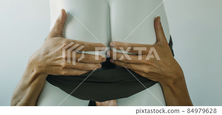grabbing the buttocks of a mannequin, web banner grabbing the buttocks of a mannequin, web banner 84979628