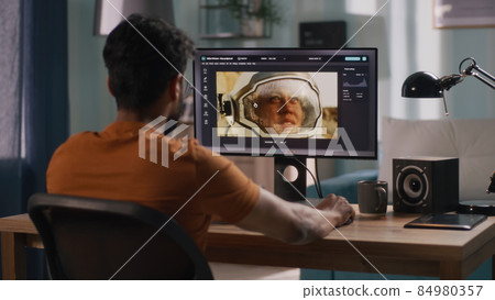 Anonymous man editing cosmonaut picture 84980357