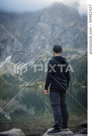 Hiking man travel outdoor lifestyle. Hiking man travel outdoor lifestyle. 84981427