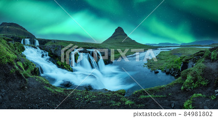Aurora borealis Northern lights over Kirkjufellsfoss waterfall Aurora borealis Northern lights over Kirkjufellsfoss waterfall 84981802