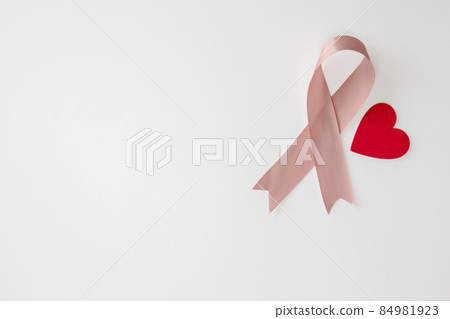 Breast Cancer Awareness Pink Ribbon en red heart . World Breast Cancer Day concept . Women healthcare concept isolated on white background 84981923
