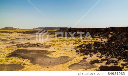 Rocky landscape at Sahara desert near Tchirozerine region, Agade 84981983