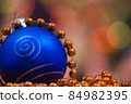 Christmas holiday decoration with blue globe and garland 84982395