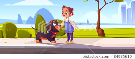 Little girl caress cute dachshund dog on street 84985610