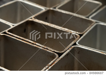 Close-up of Artisan bakery. empty filling metal bakeware Close-up of Artisan bakery. empty filling metal bakeware 84986687