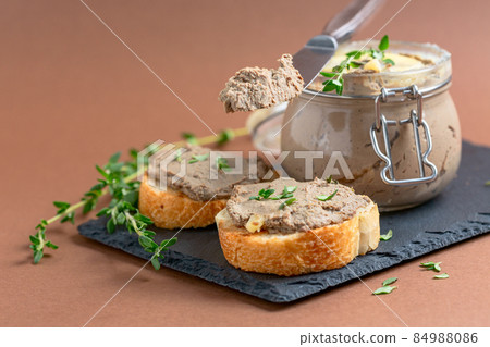 Toasts with homemade liver pate. 84988086