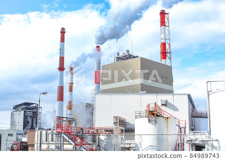 Paper mill chimneys and smoke 84989743